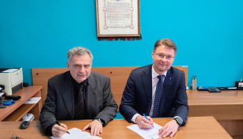 dyrektor Śl.TZN oraz Dyretor TUV podpisują porozumienie